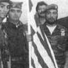 Radovan Karadzic pictured with Greek volunteers who fought alongside the Bosnian Serbs.