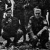 Greek and Serb soldiers flying the Greek and Serbian cross flags after the capture of Srebrenica.